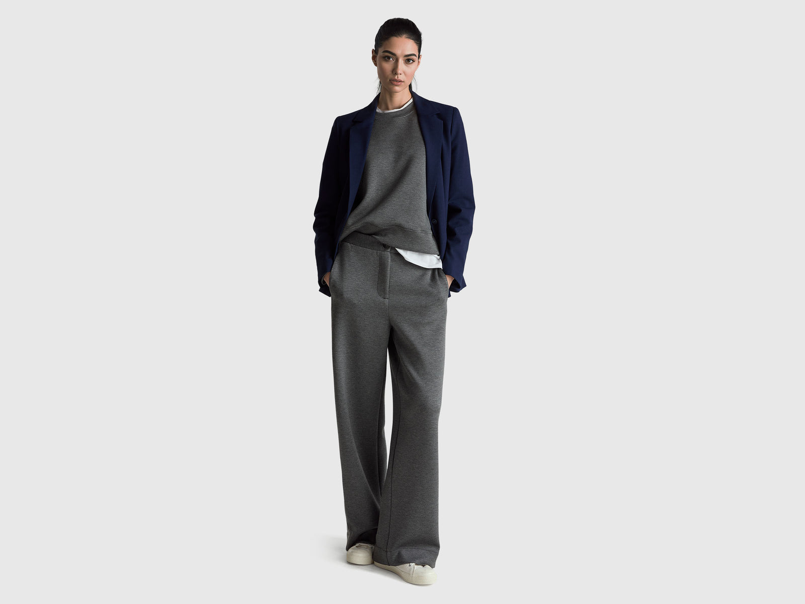Wide trousers with side stripes