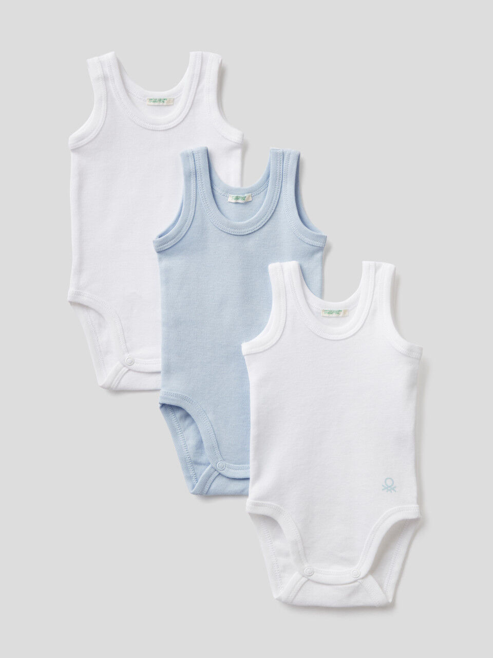 Three solid color tank top bodysuits