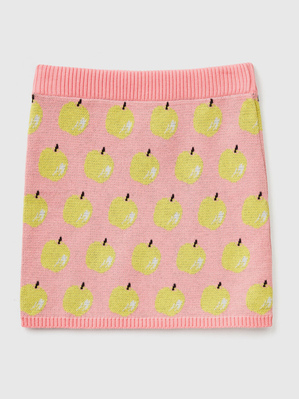 Pink mini skirt with apple pattern