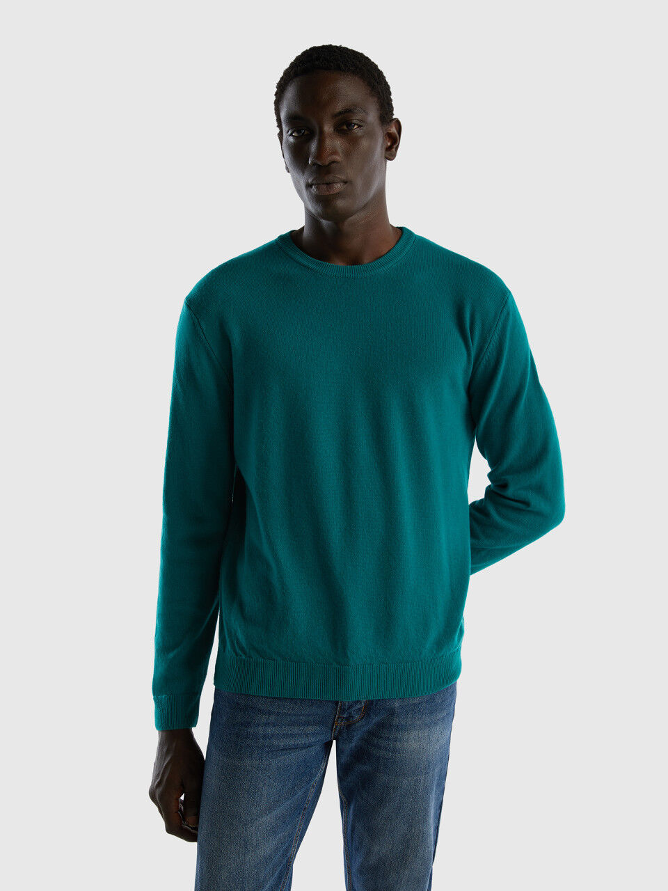 Dark green crew neck sweater in pure Merino wool